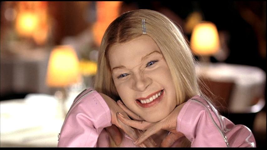 Coffe shop interior with warm lighting and wooden furniture